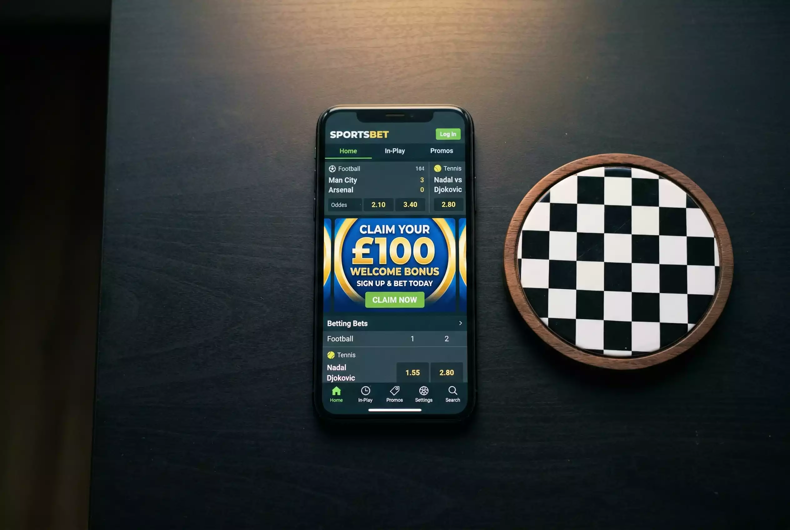 Smartphone mit einer Sportwetten-App und einem Bonusangebot auf dem Bildschirm